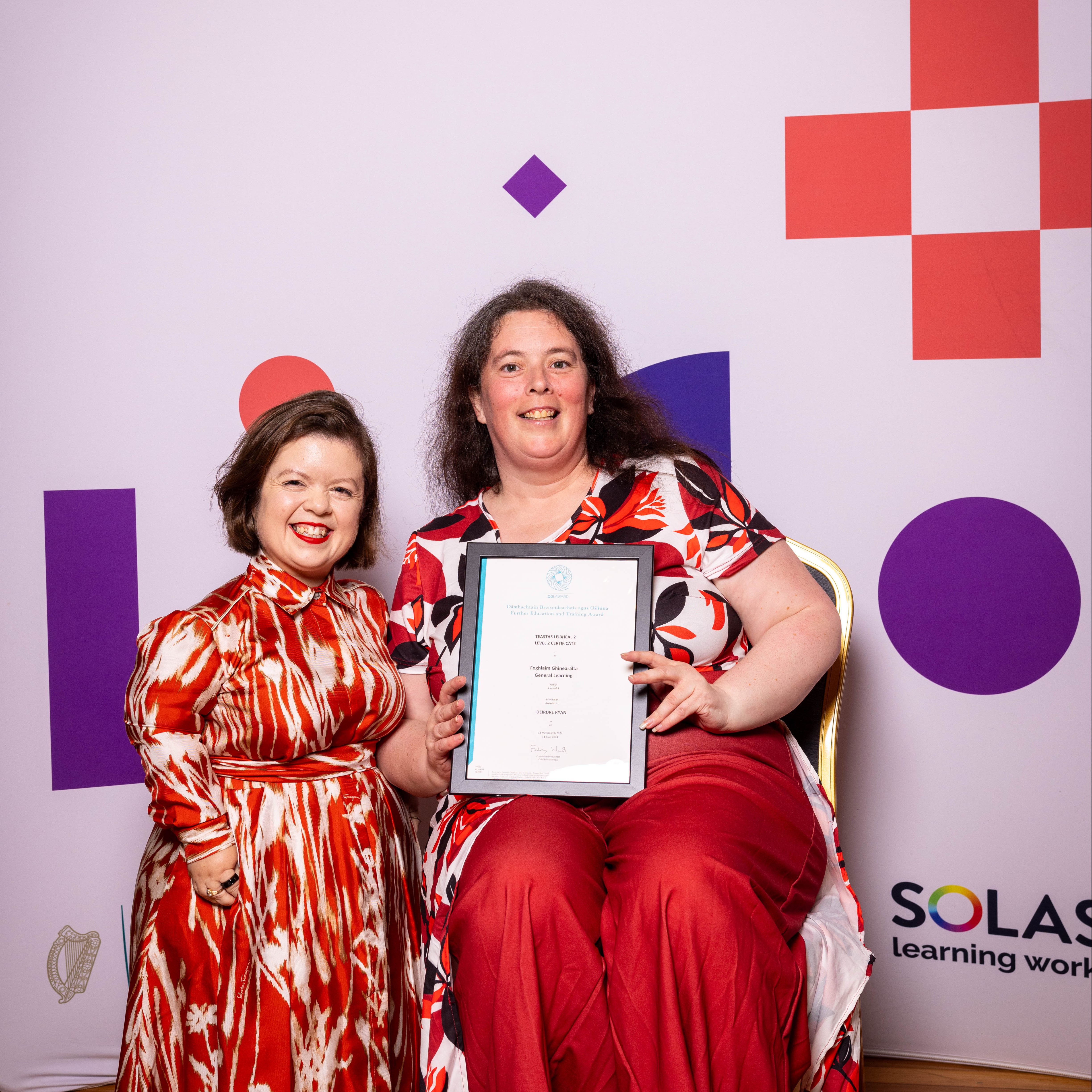 Deirdre Ryan receiving her award from Sinéad Burke